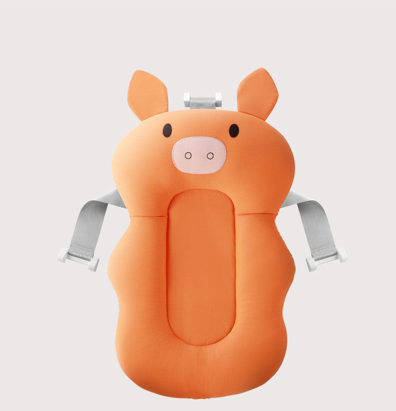 Orange pig-shaped baby seat with straps on a light gray background