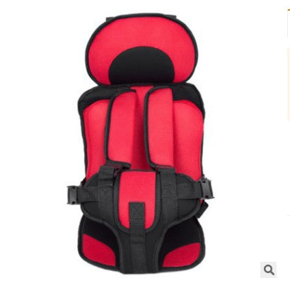 Red and black child safety seat on a white background
