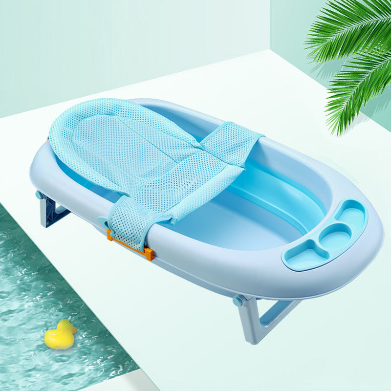 Blue baby bathtub with mesh seat and yellow rubber duck on a light green background