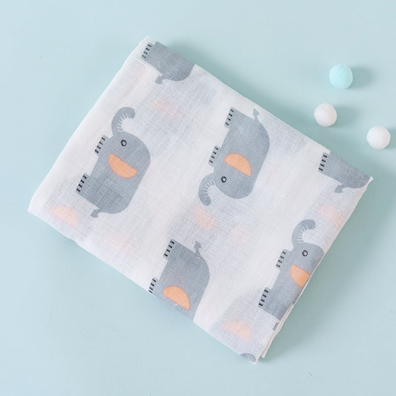 Baby blanket with elephant pattern on a light blue background