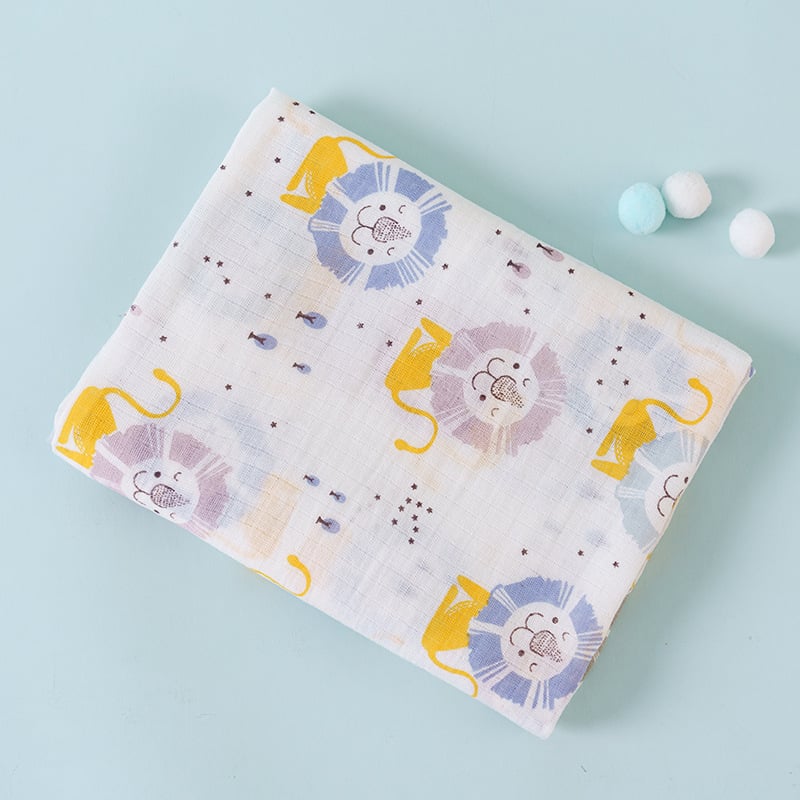 Baby blanket with lion pattern on a light blue background