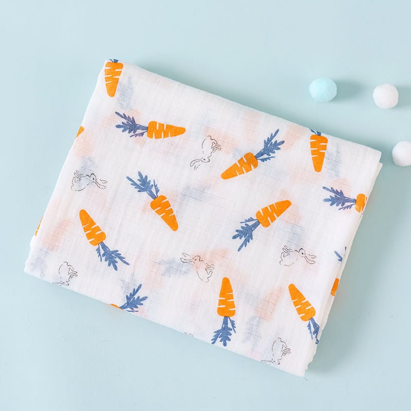 Fabric with carrot and rabbit pattern on a light blue background