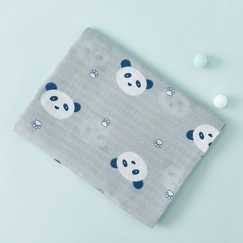 Gray fabric with panda pattern on a light blue background