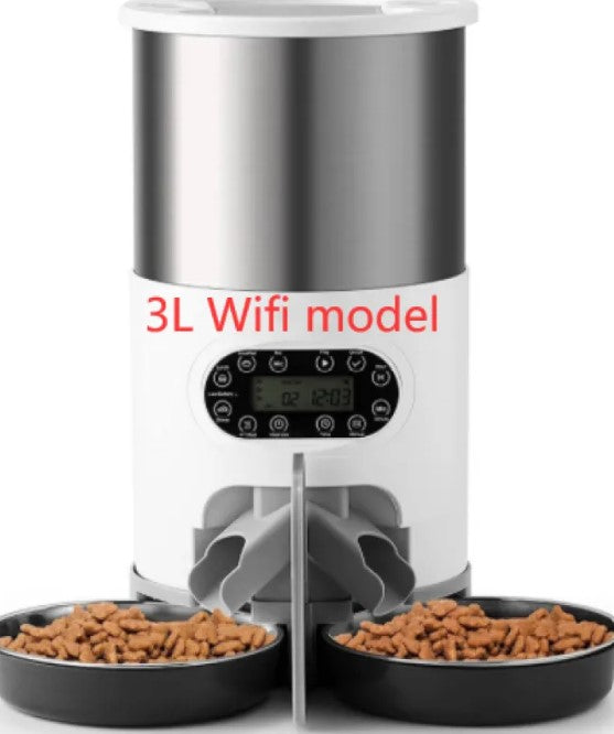 Pet food dispenser with two bowls of kibble on a white background
