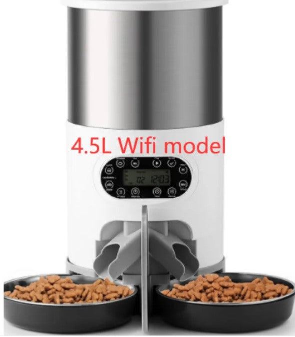 Automatic pet feeder with two bowls of food on a white background