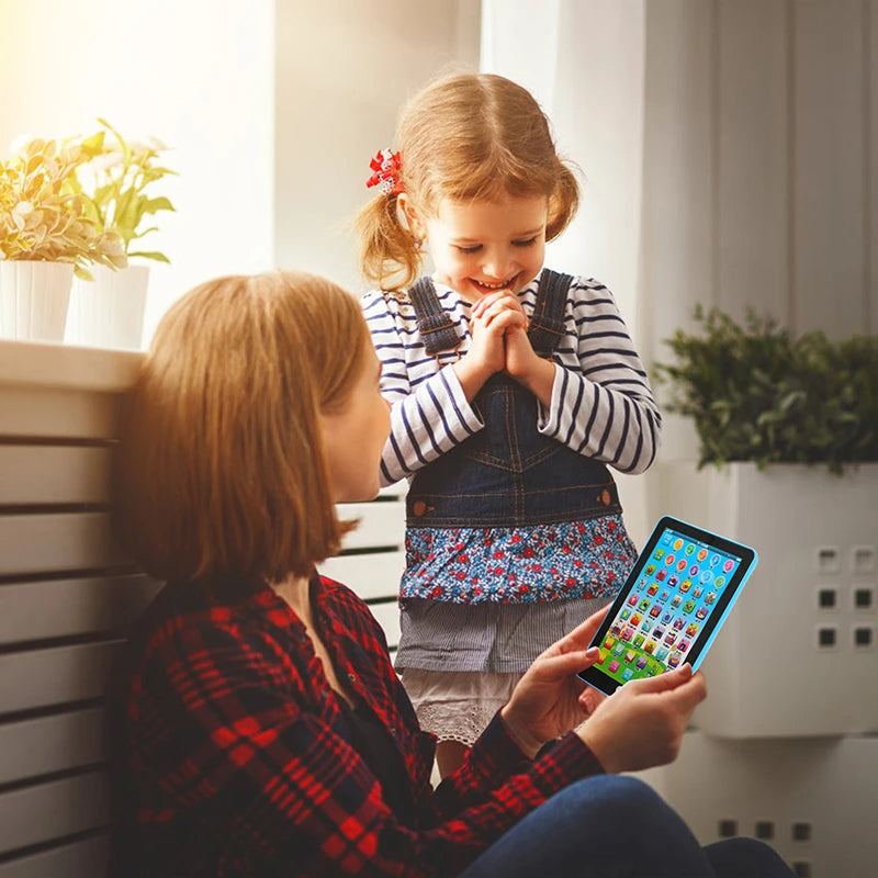 Two children sitting together, one using a tablet with colorful app icons.