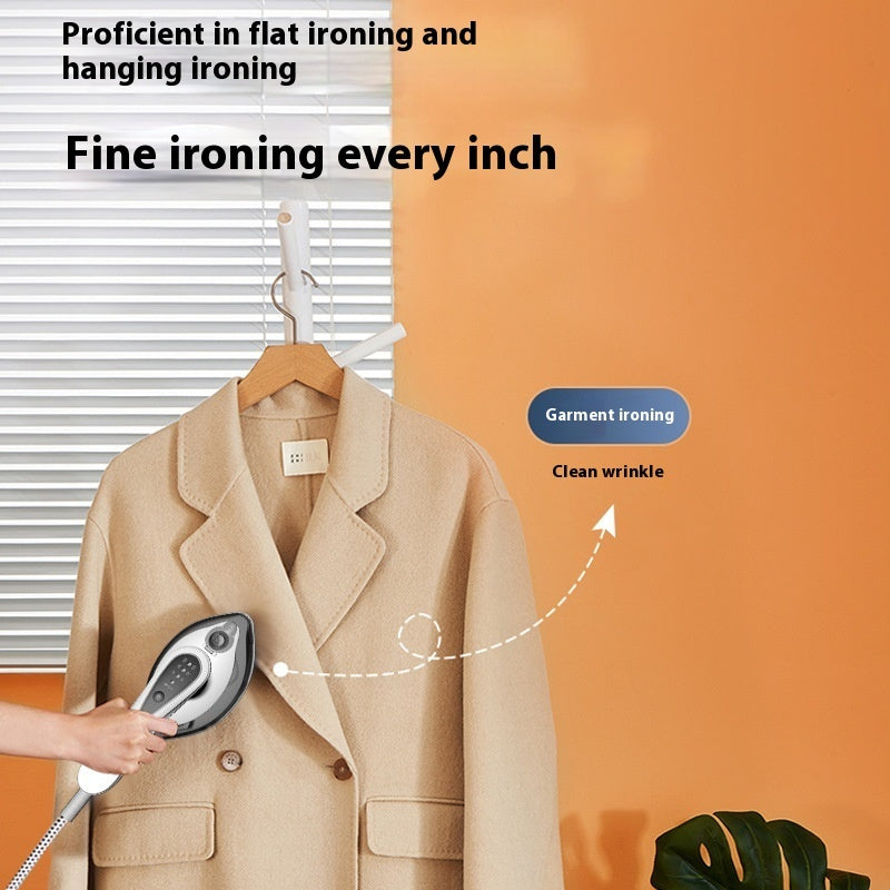 Beige coat on a hanger with a steam iron being used to remove wrinkles against an orange background.