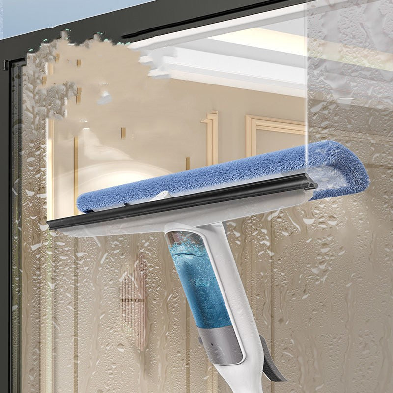 Window cleaning tool with blue sponge and squeegee on a glass surface