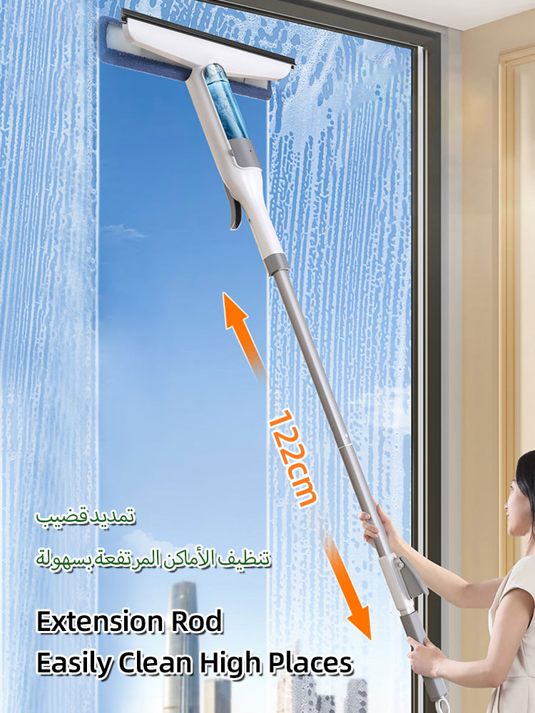 Person using a window cleaning tool with an extension rod to clean a high window.