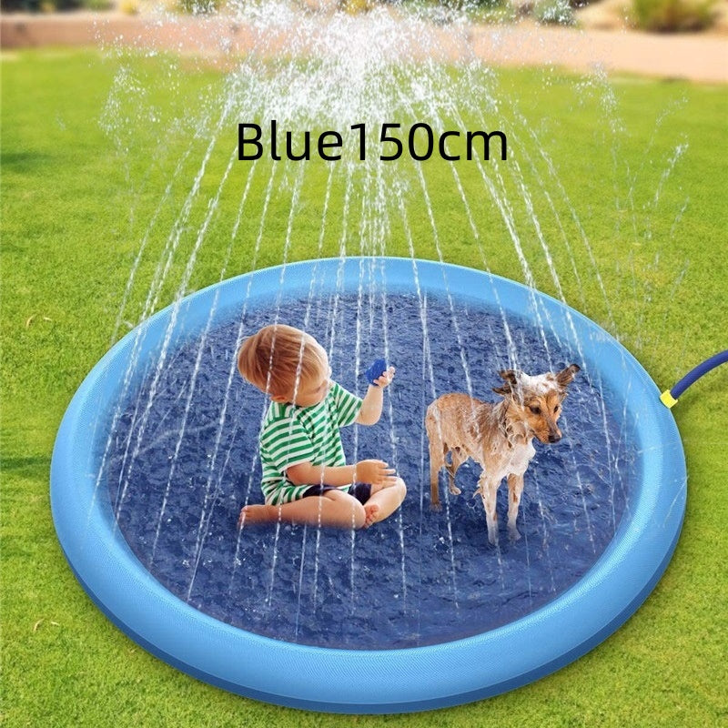 Children playing on a blue inflatable sprinkler pad with water splashing around, on grass.
