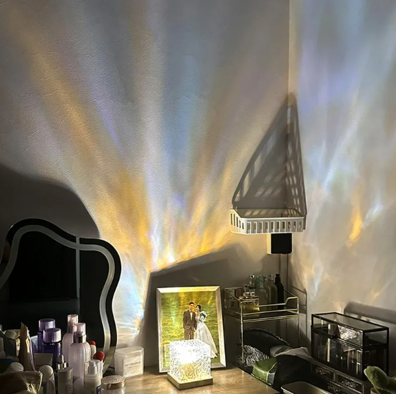 Modern interior design with a large mirror, decorative items, and a stylish chair.