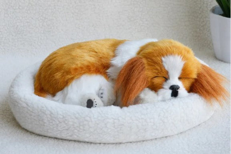 White Lifelike Plush Dog Toy with a sleeping brown dog inside on a wite background
