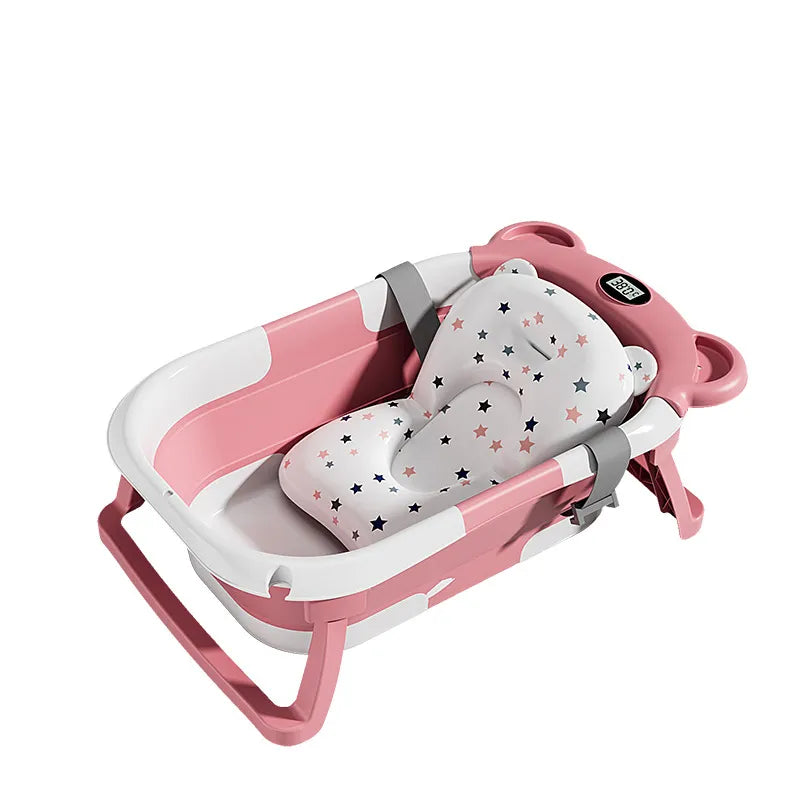 Pink and white baby bathtub with star-patterned seat on a white background