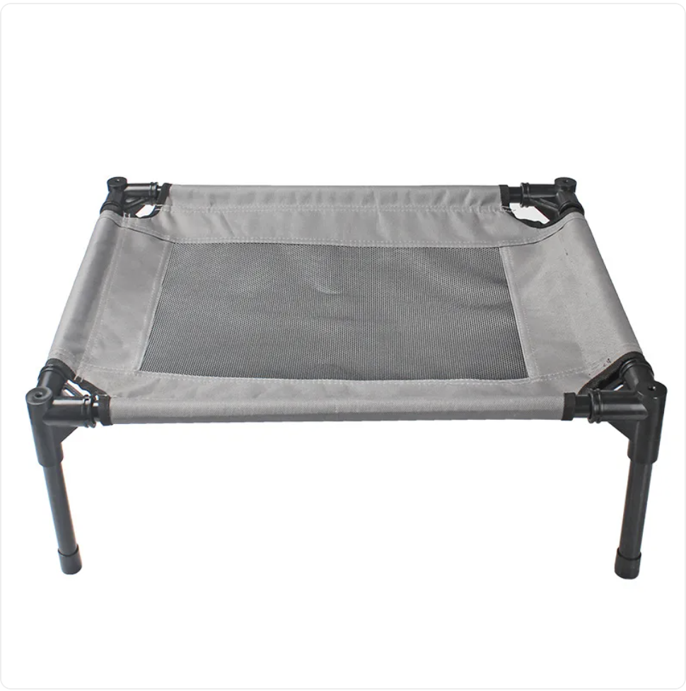Gray pet cot with mesh design on a white background