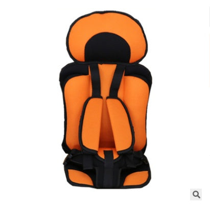 Orange and black child safety seat on a white background