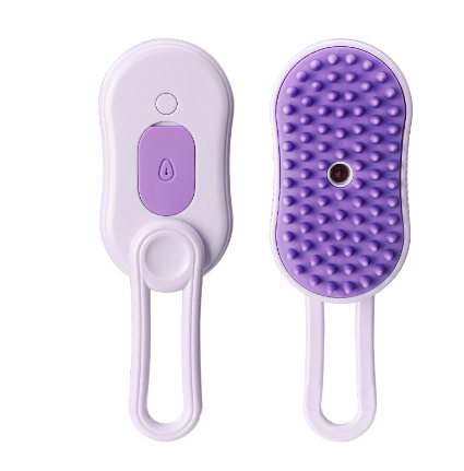 Purple and white grooming brush on a white background